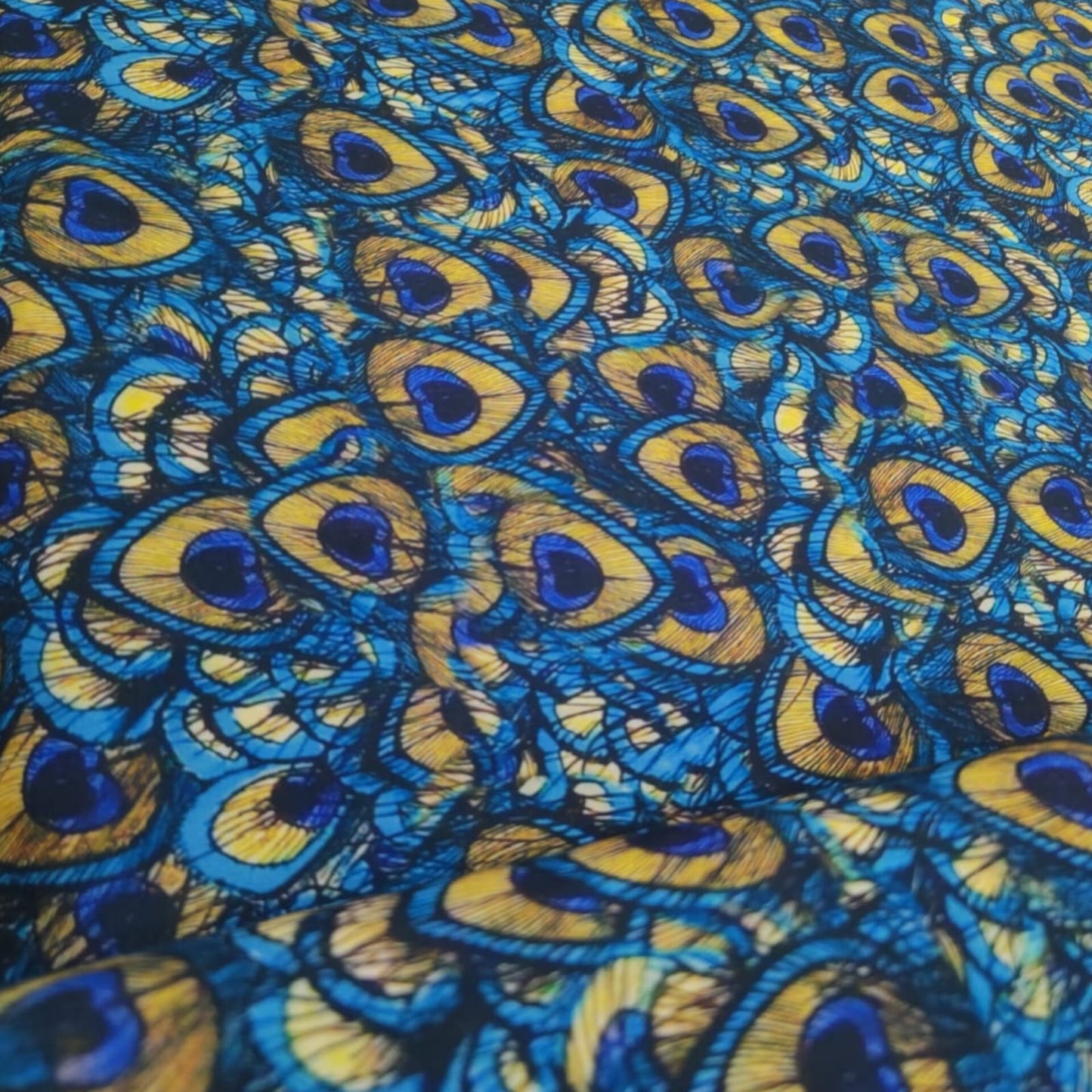 Muslin Silk Peacock Print fabric